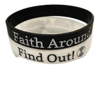 Black and white Take Root Movement silicone bracelets with the ‘Faith Around Find Out’ faith based message and circular tree and roots logo displayed on a clean surface.