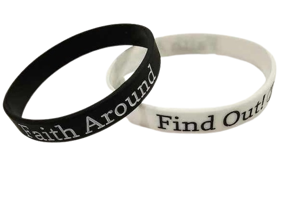 Black and white Christian silicone wristbands displaying the ‘Faith Around Find Out’ message and tree and roots logo, shown on a white surface.